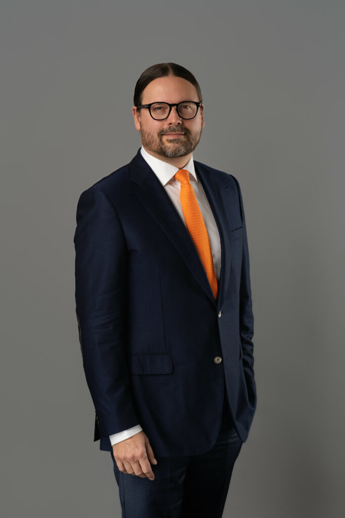 Malcolm Macpherson posing for a corporate team directory headshot
