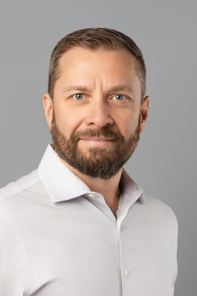 Male executive from BMO Capital Markets posing for a headshot in Vancouver at HeadshotPhoto.ca's studio